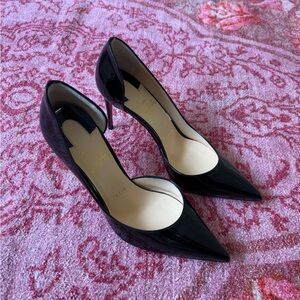 Christian Louboutins cut out inside